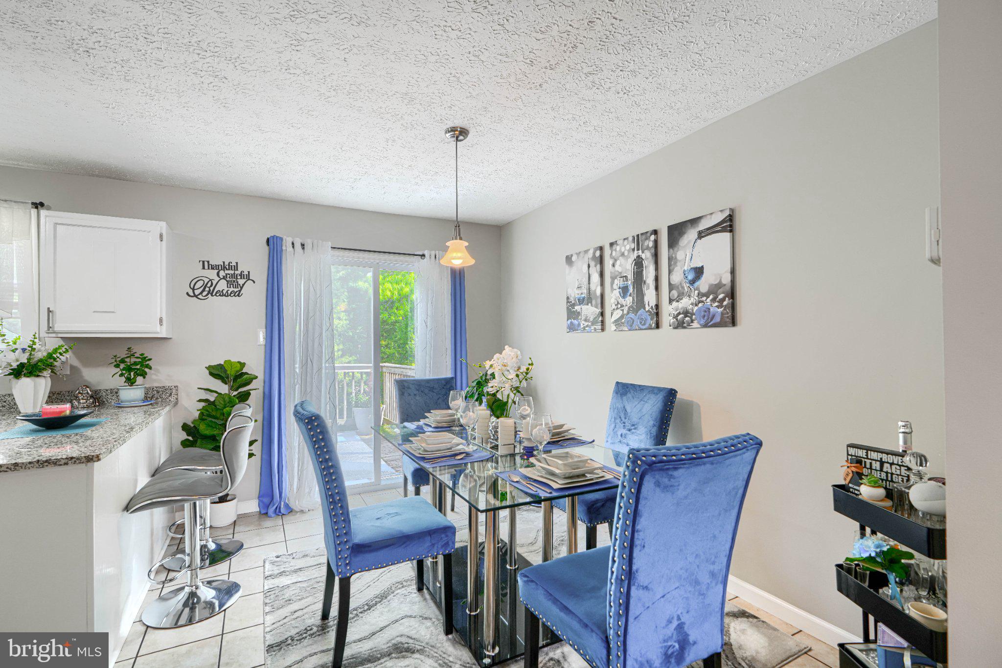 4067 Rustico Road Baltimore, MD 21220 - Photo 10 of 31 Chic dining space with vibrant accents.