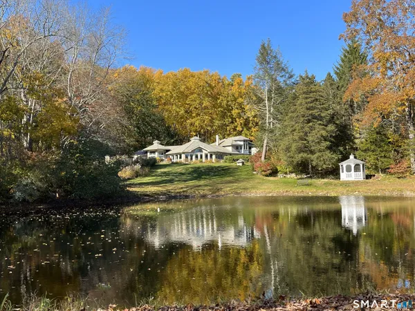 a view of swimming pool from a lake