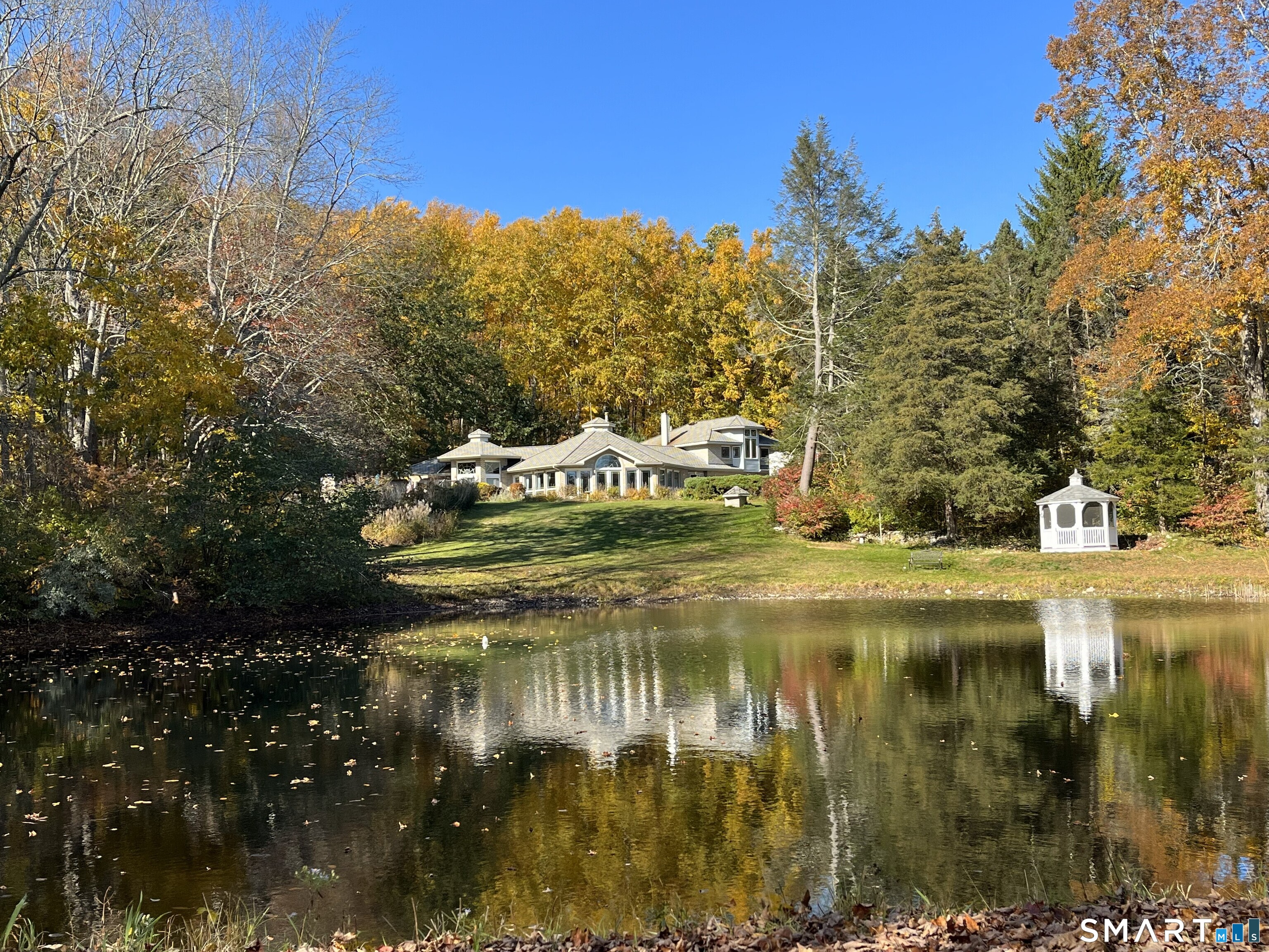 a view of swimming pool from a lake