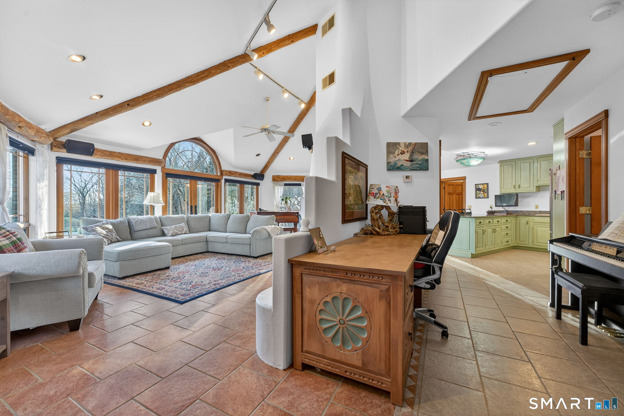 349 South Bigelow Road Hampton, CT 06247 - Photo 11 of 40 a living room with furniture a fireplace and a large window