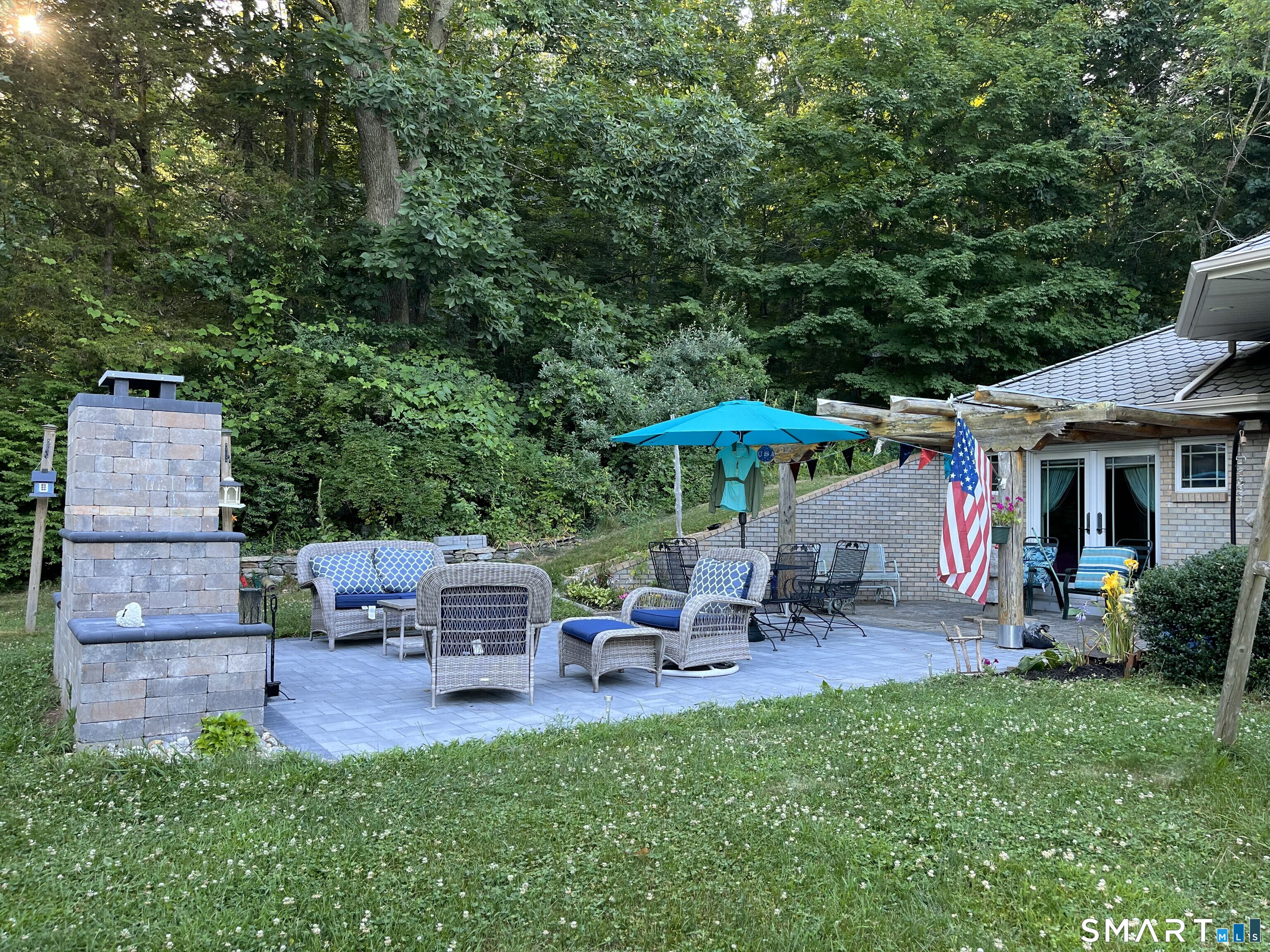 349 South Bigelow Road Hampton, CT 06247 - Photo 30 of 40 an outdoor sitting area with chairs and wooden fence