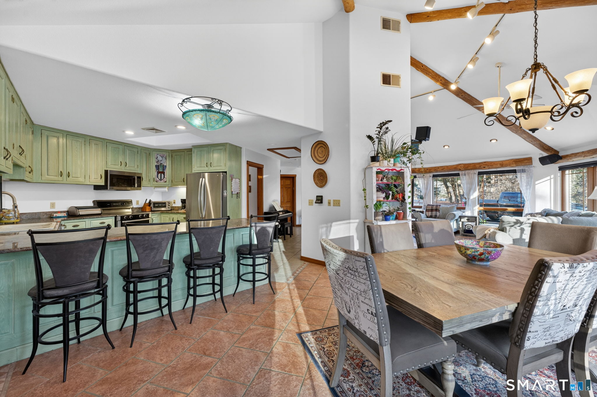 349 South Bigelow Road Hampton, CT 06247 - Photo 8 of 40 a view of a dining room with furniture and wooden floor