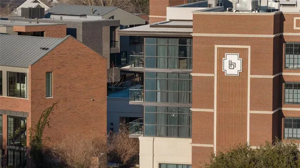 a front view of a house with a glass door
