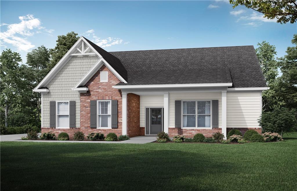 4155 Golden Knoll Road Cumming, GA 30028 - Photo 1 of 1 a front view of a house with a garden and yard