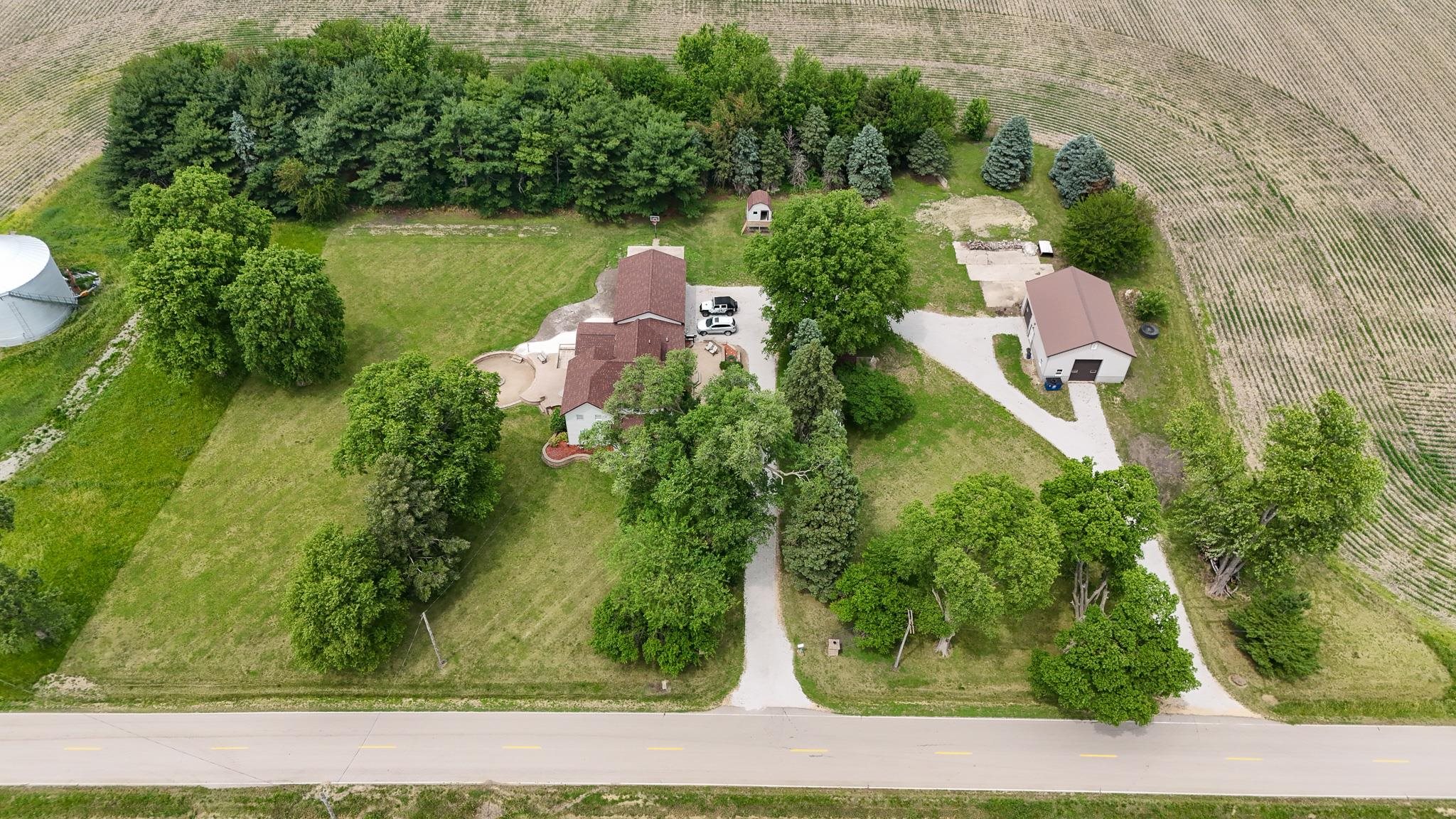 382 Keigwin Road Walnut, IL 61376 - Photo 19 of 68 an aerial view of a house with a yard and lake view
