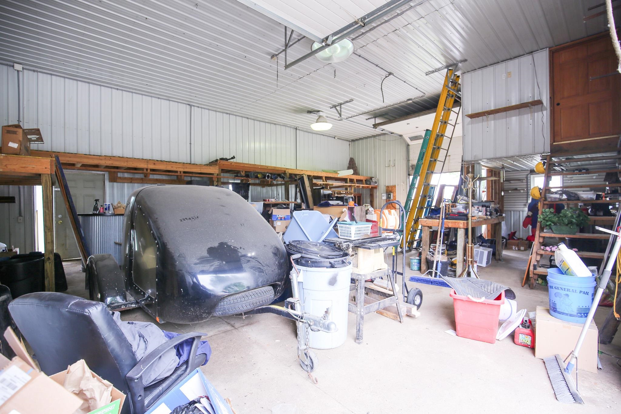 382 Keigwin Road Walnut, IL 61376 - Photo 20 of 68 a room with lots of furniture and clutter