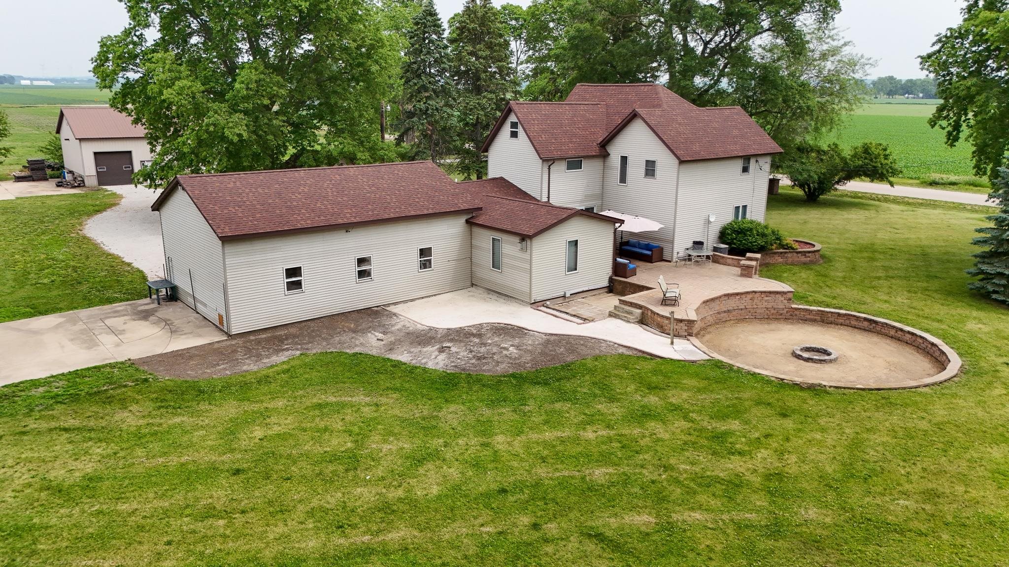 382 Keigwin Road Walnut, IL 61376 - Photo 3 of 68 a aerial view of a house with a yard and sitting area