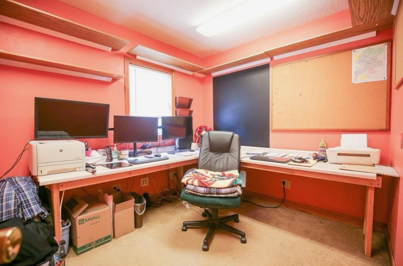 382 Keigwin Road Walnut, IL 61376 - Photo 32 of 68 a view of a workspace with furniture and a window