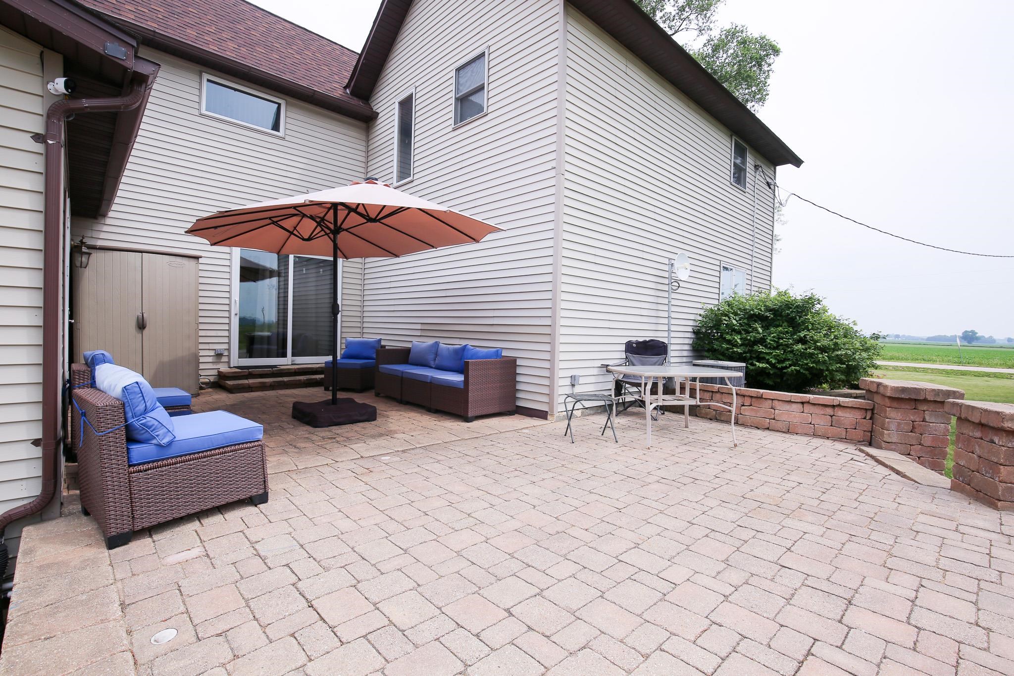 382 Keigwin Road Walnut, IL 61376 - Photo 55 of 68 a view of a house with backyard and sitting area