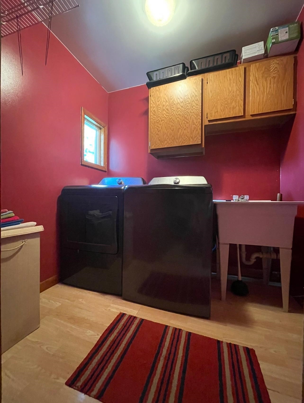 382 Keigwin Road Walnut, IL 61376 - Photo 63 of 68 a living room with a bed furniture and a flat screen tv