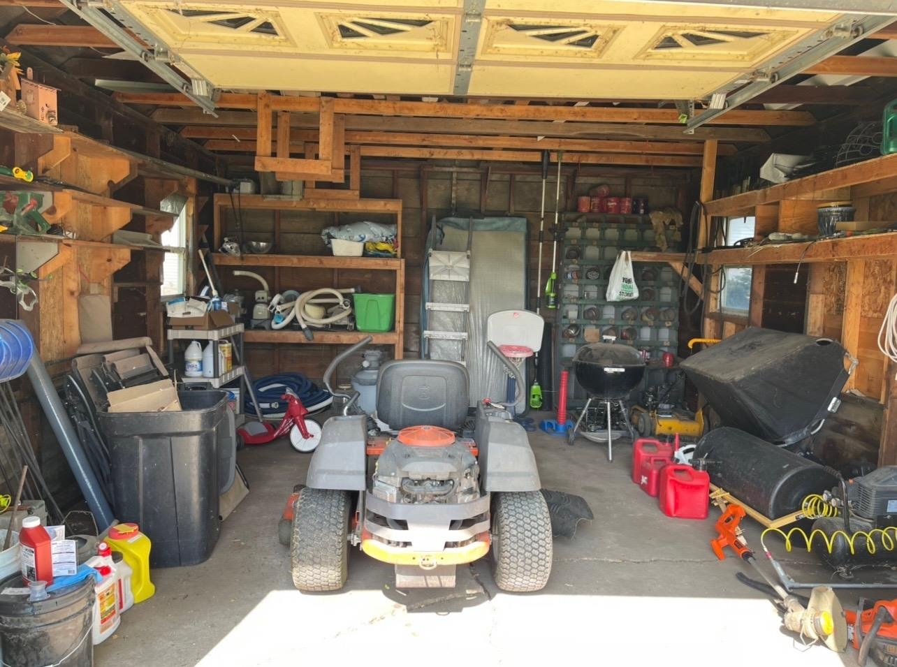 382 Keigwin Road Walnut, IL 61376 - Photo 65 of 68 a store room with lots of different colored cloths