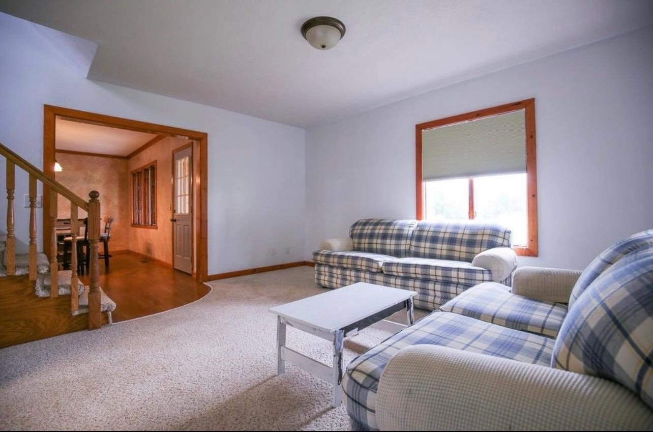 382 Keigwin Road Walnut, IL 61376 - Photo 67 of 68 a living room with furniture and a window