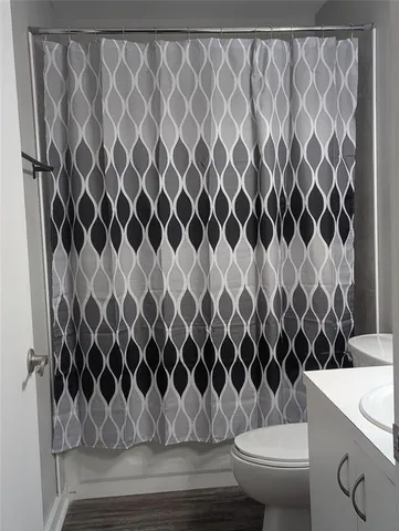 a bathroom with a sink and a toilet