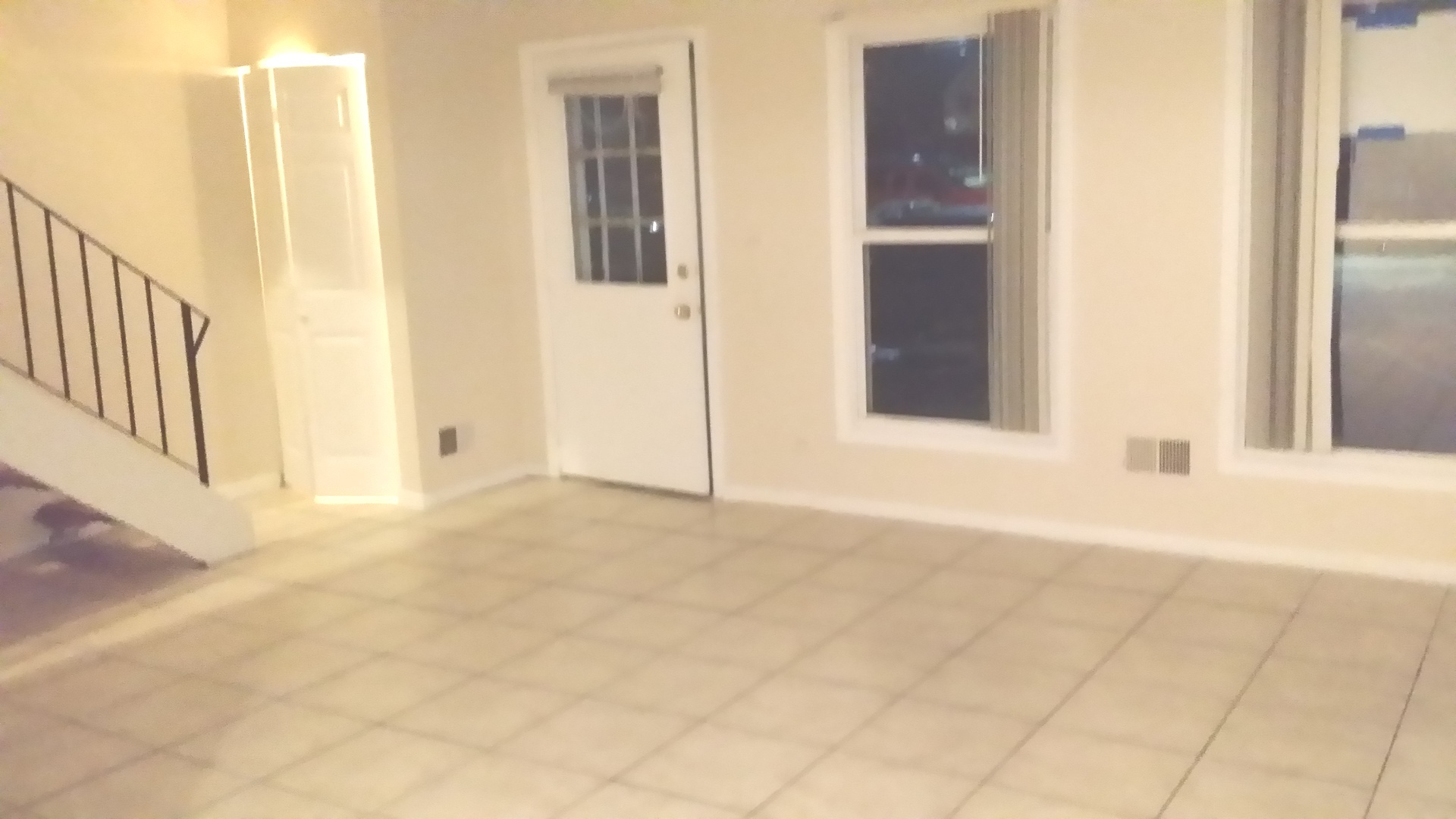 1854 Jamestown Circle Hoffman Estates, IL 60169 - Photo 4 of 10 a view of an empty room with entrance and door
