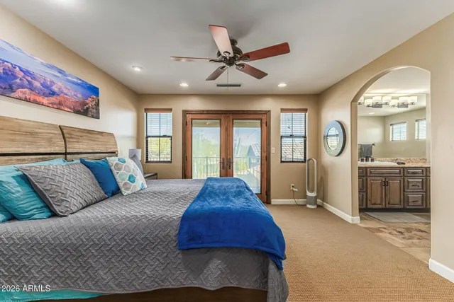 a view of a patio with table and chairs