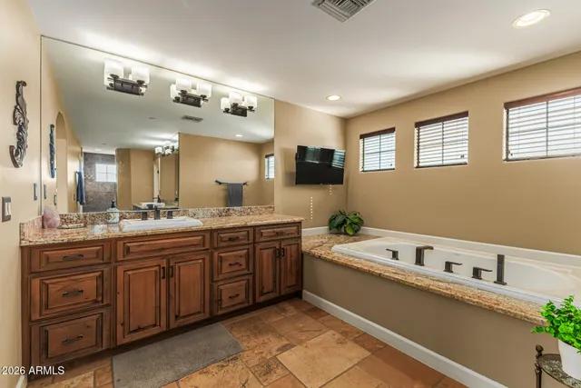 a view of a patio with table and chairs and potted plants