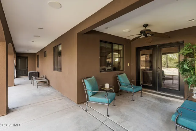 a room with furniture and a flat screen tv
