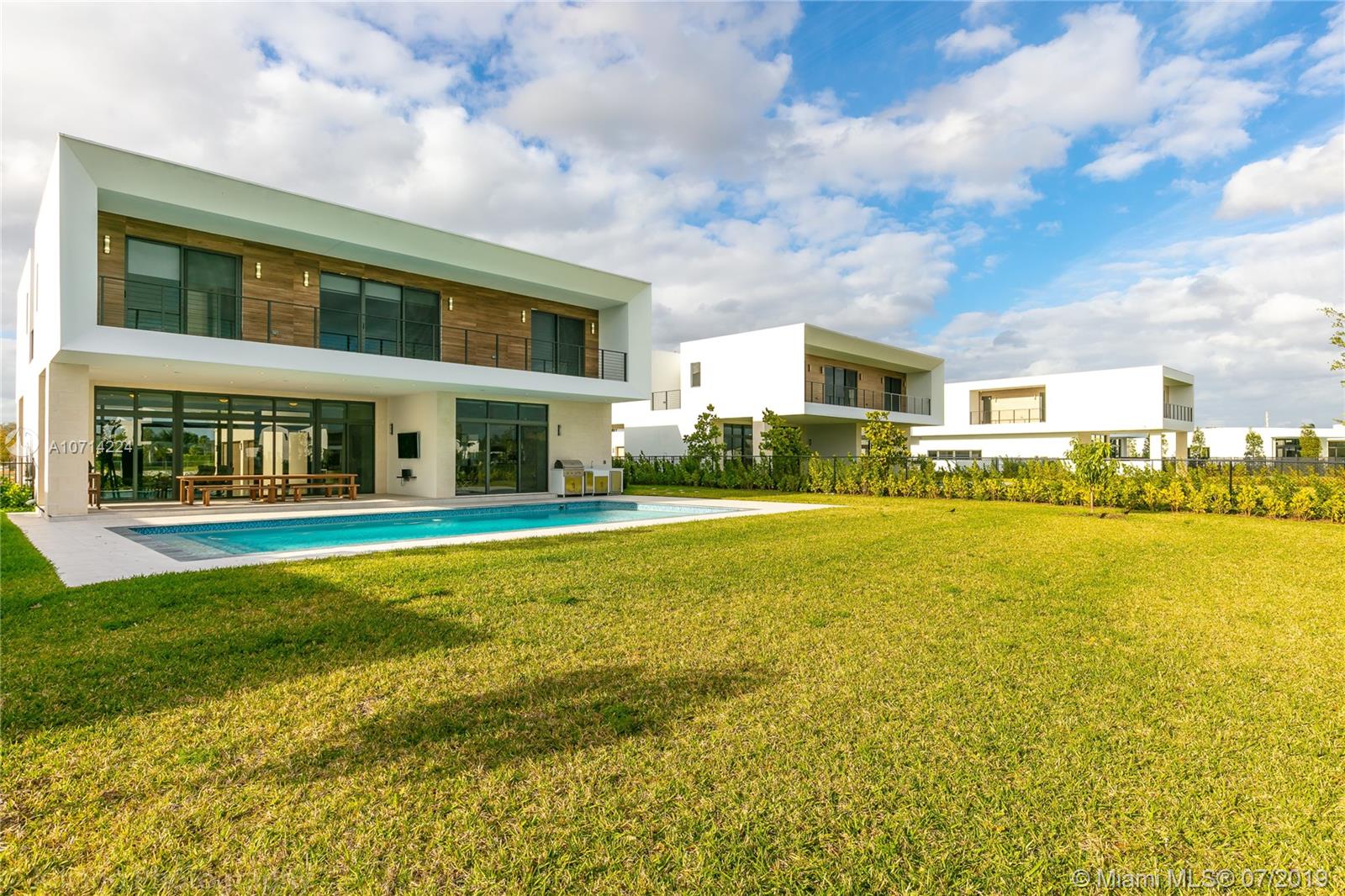 16630 Sunset Way Weston, FL 33326 - Photo 3 of 17 a front view of house with yard