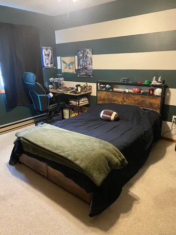 a view of a entryway door of the room