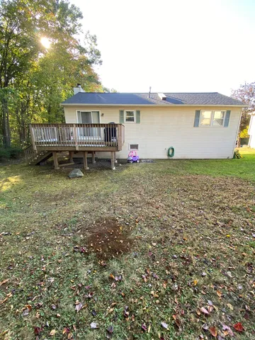 a view of staircase with wooden floor