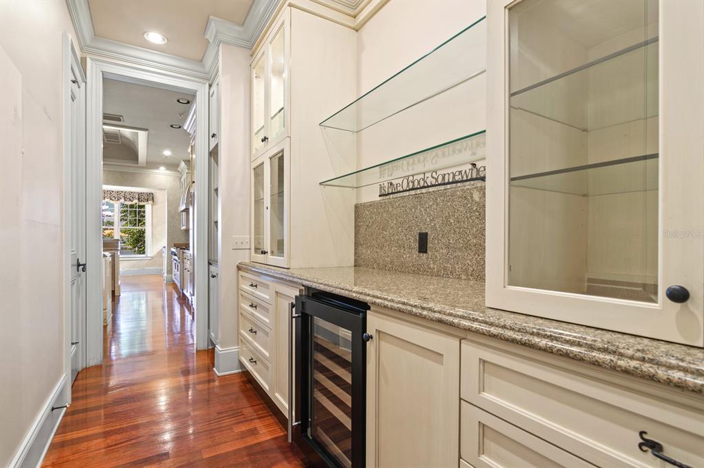 1029 Royal Pass Road Tampa, FL 33602 - Photo 26 of 68 a spacious bathroom with a granite countertop sink and a mirror