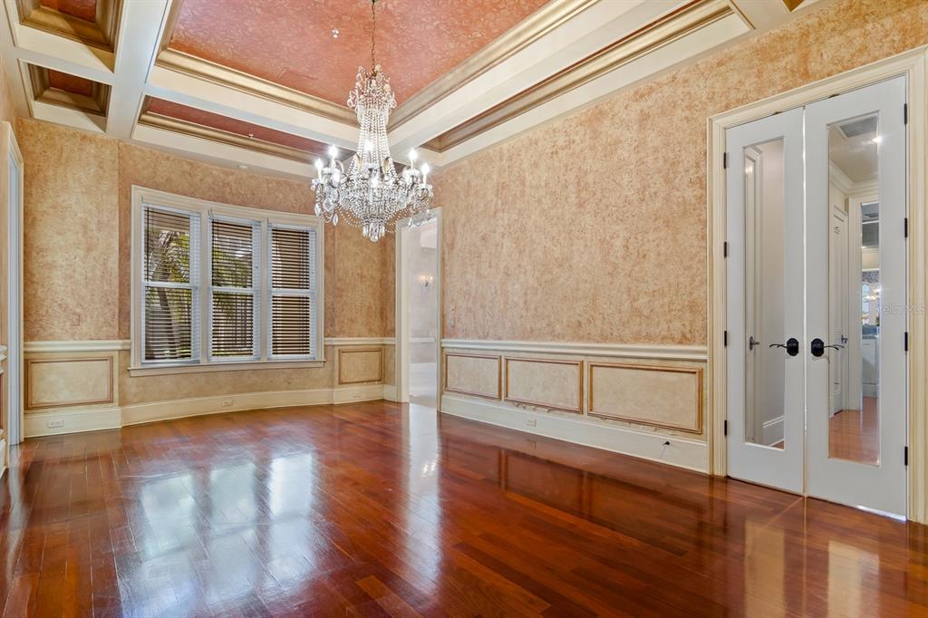 1029 Royal Pass Road Tampa, FL 33602 - Photo 27 of 68 a view of an empty room with wooden floor and a window