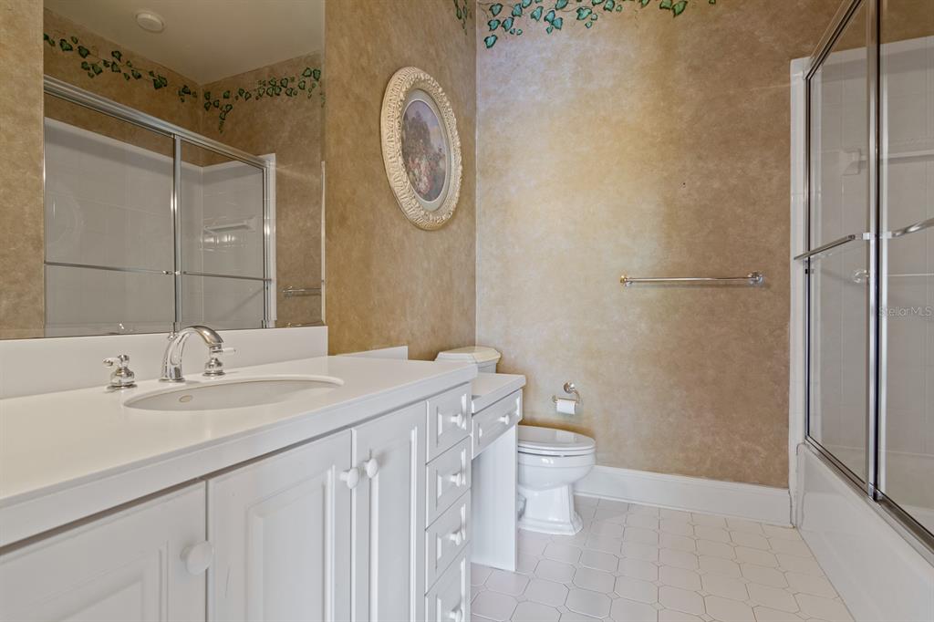 1029 Royal Pass Road Tampa, FL 33602 - Photo 42 of 68 a bathroom with a sink and a mirror