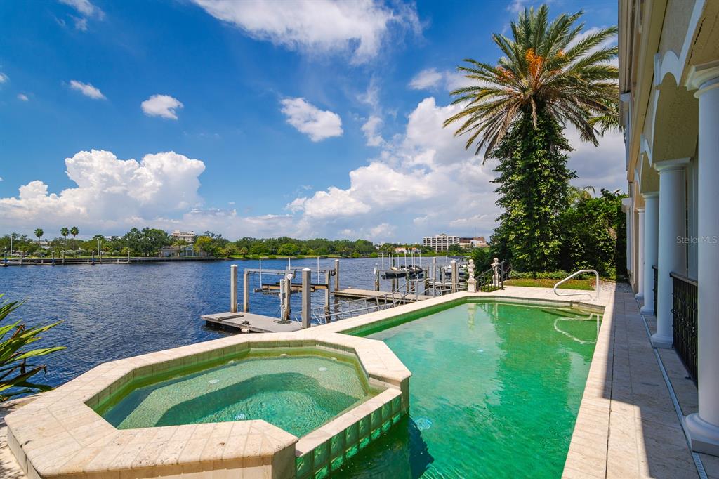 1029 Royal Pass Road Tampa, FL 33602 - Photo 61 of 68 a view of a swimming pool with a lake view