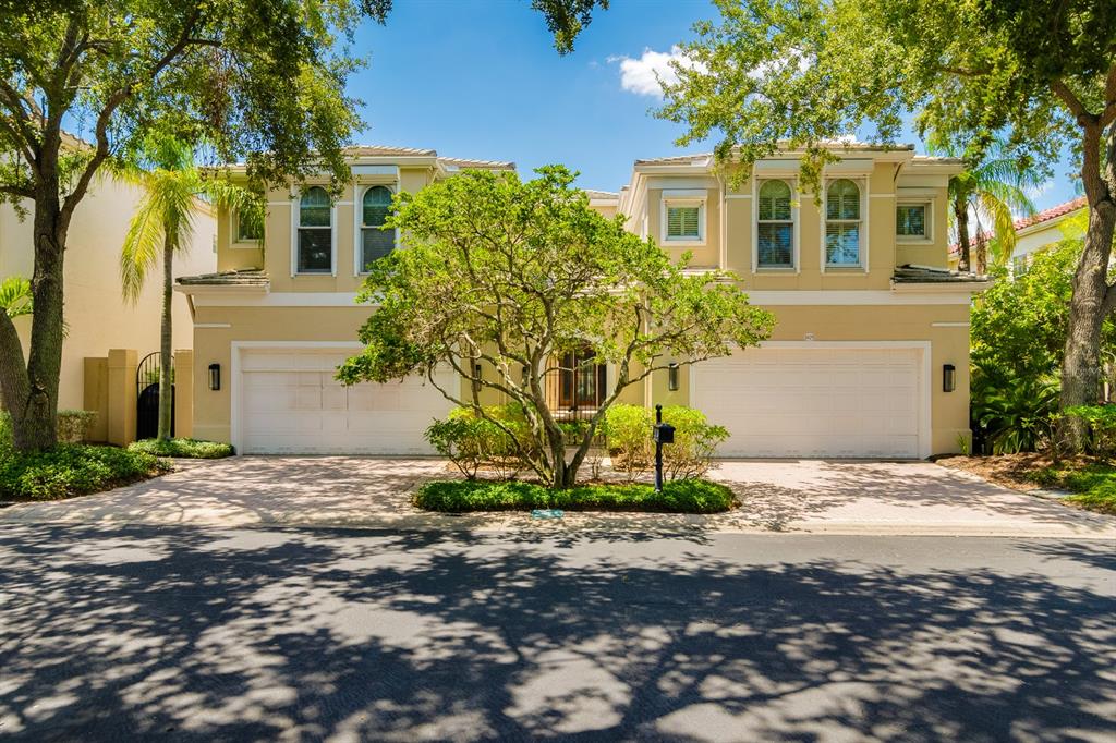 1029 Royal Pass Road Tampa, FL 33602 - Photo 7 of 68 a front view of a house with a yard and a garage