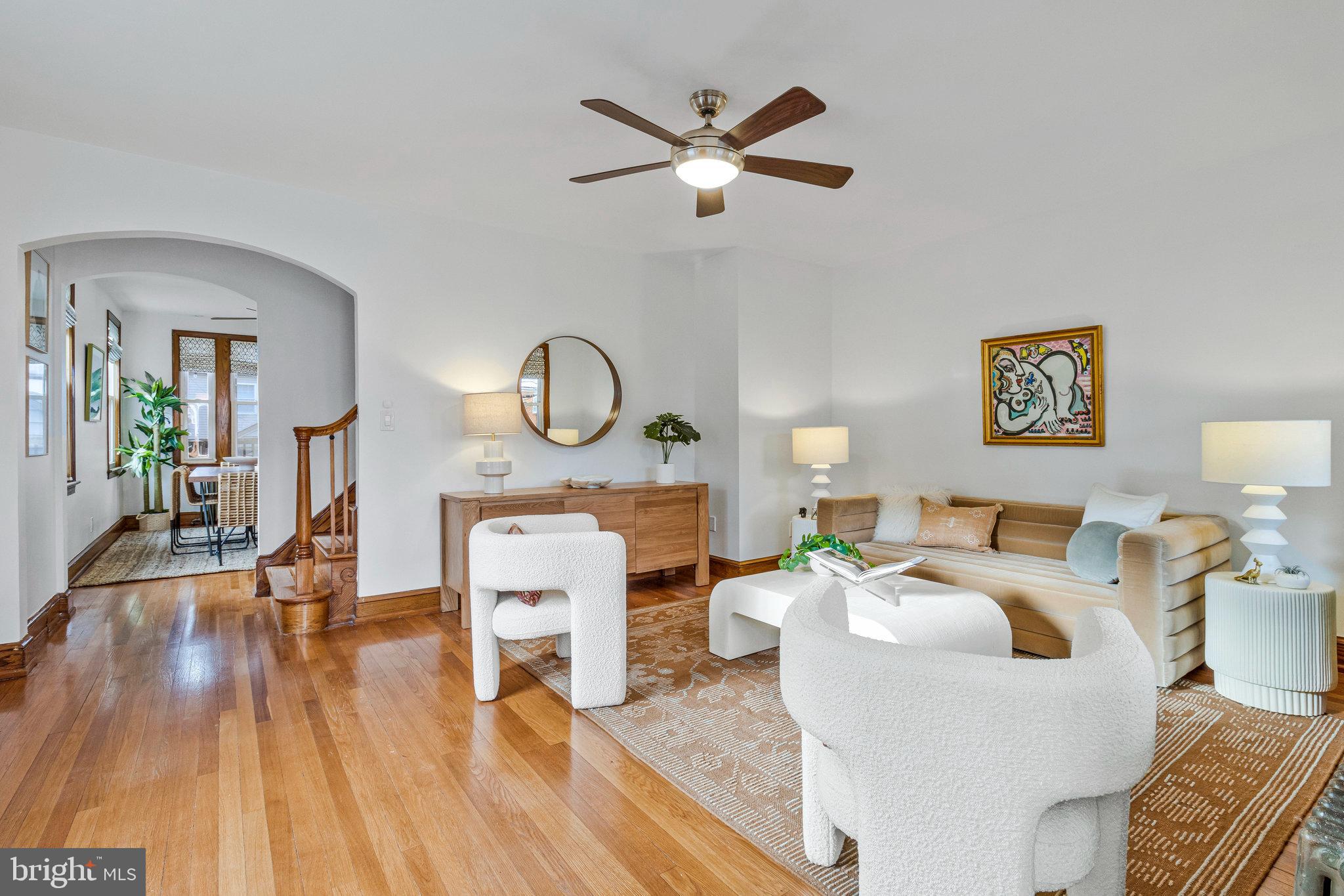 4900 1st Street Northwest Washington, DC 20011 - Photo 3 of 35 a living room with furniture a window and a clock