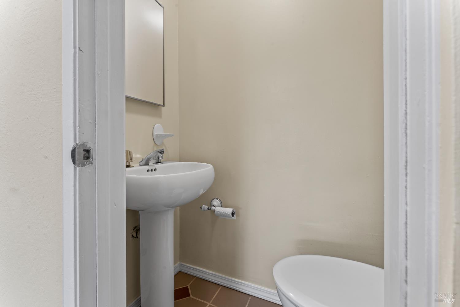 210 Trinity Court Rio Vista, CA 94571 - Photo 19 of 38 a bathroom with a sink toilet and a mirror