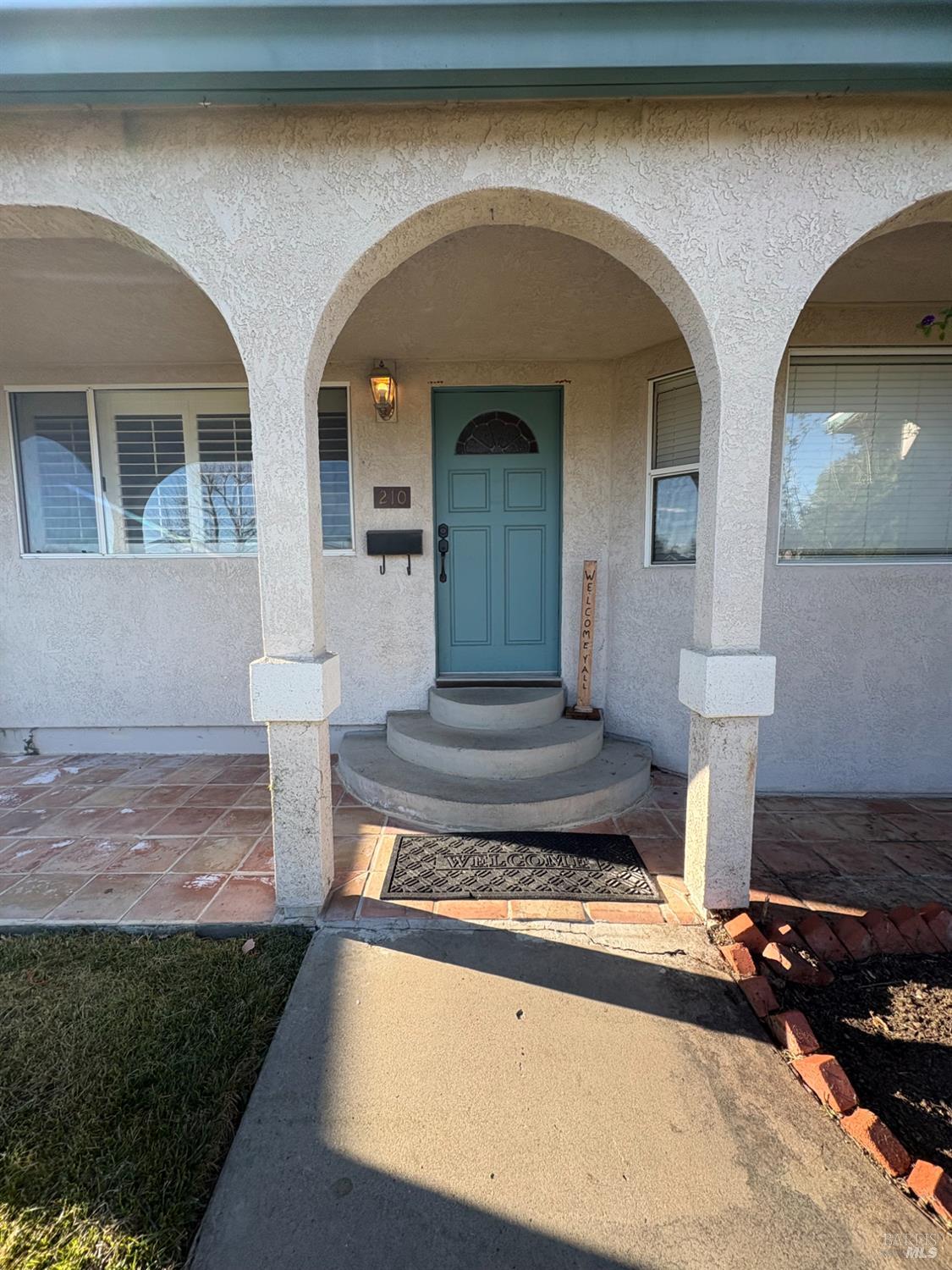 210 Trinity Court Rio Vista, CA 94571 - Photo 32 of 38 a front view of a house with a yard