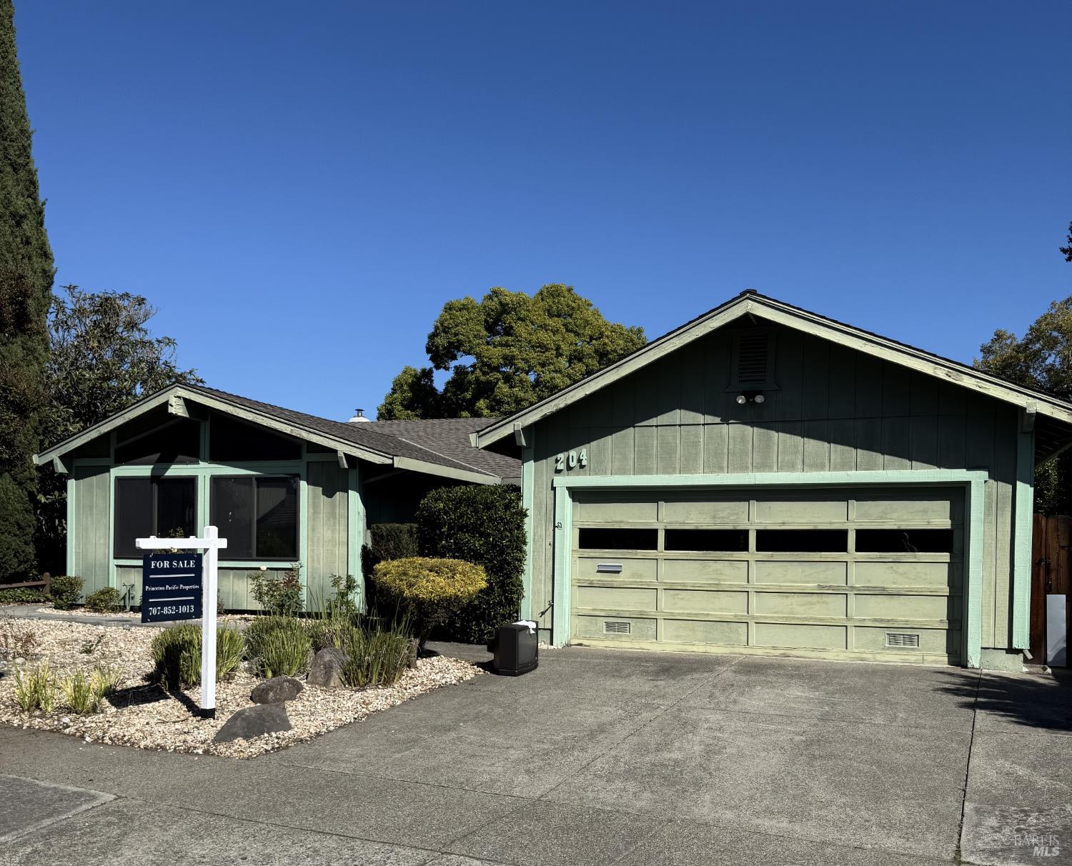 204 Yates Drive Santa Rosa, CA 95405 - Photo 1 of 1 a front view of a house with garden