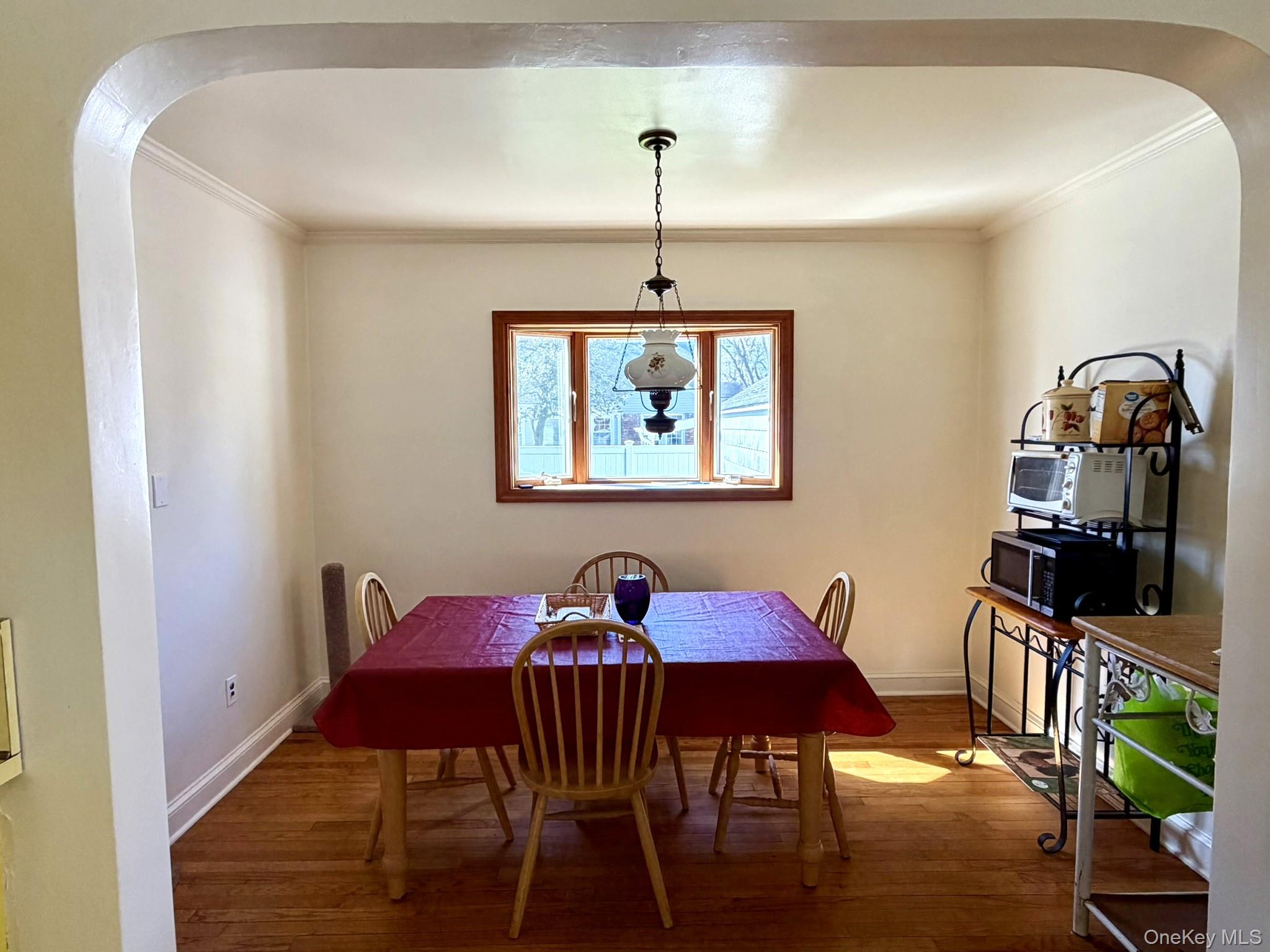 586 Stratford Road Baldwin, NY 11510 - Photo 12 of 24 Formal Dining Room with Wood Floors