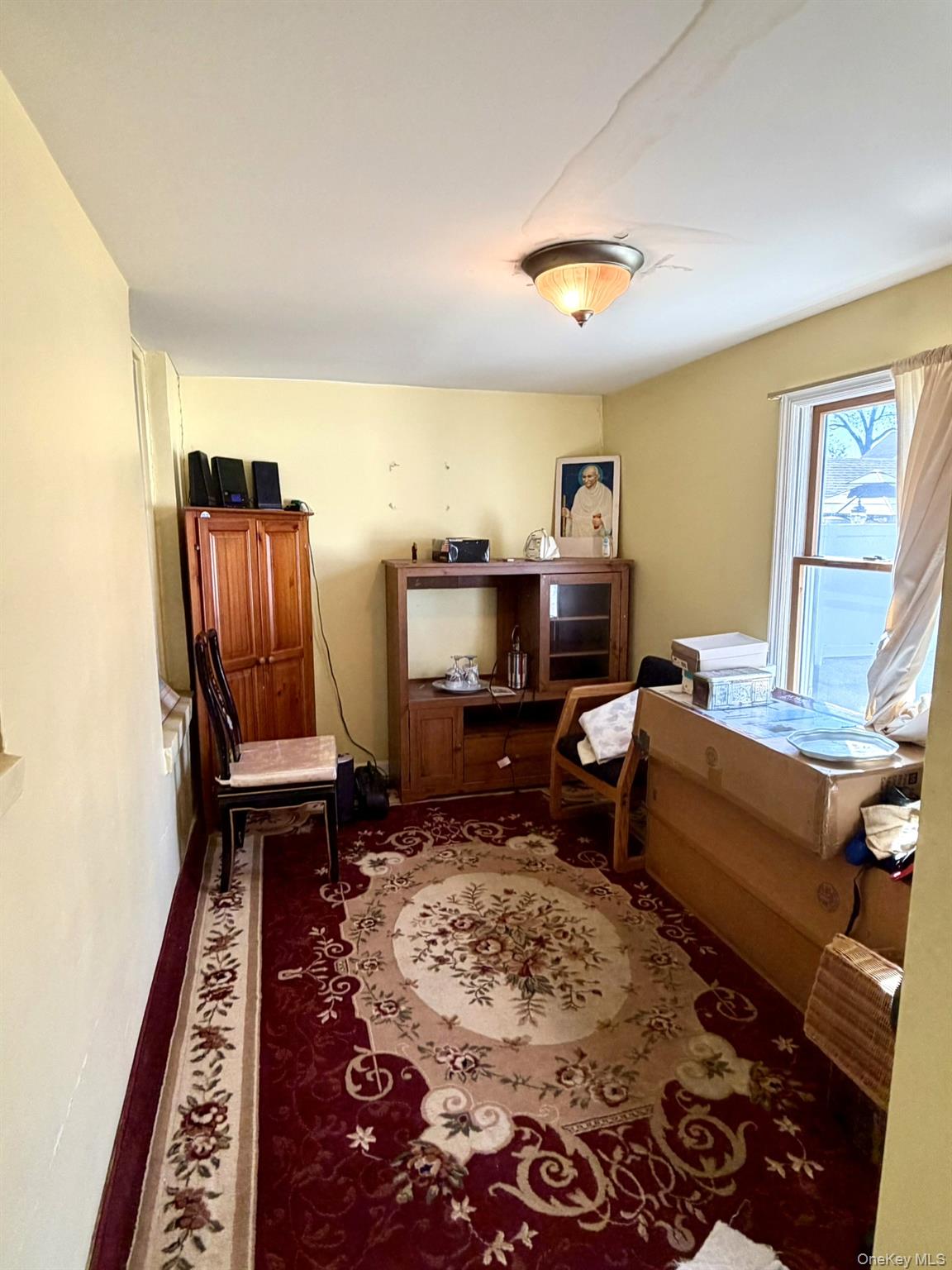 586 Stratford Road Baldwin, NY 11510 - Photo 14 of 24 Enclosed Porch from Formal Dining Room