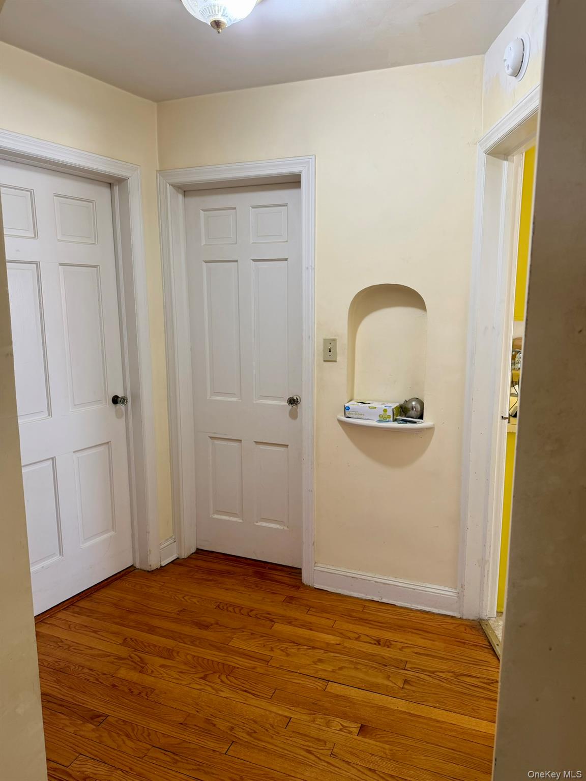 586 Stratford Road Baldwin, NY 11510 - Photo 5 of 24 Foyer with Wood Floors to Bedrooms-Full Bath-Kitchen