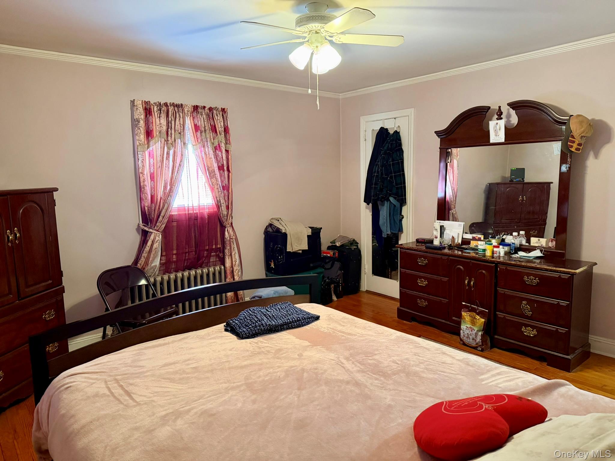 586 Stratford Road Baldwin, NY 11510 - Photo 7 of 24 Large Primary Bedroom with Wood Floors 1st Floor (other view)