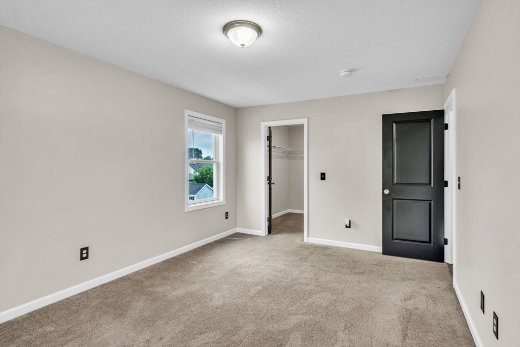 25 Thomas Street Chicopee, MA 01013 - Photo 16 of 36 an empty room with windows and closet