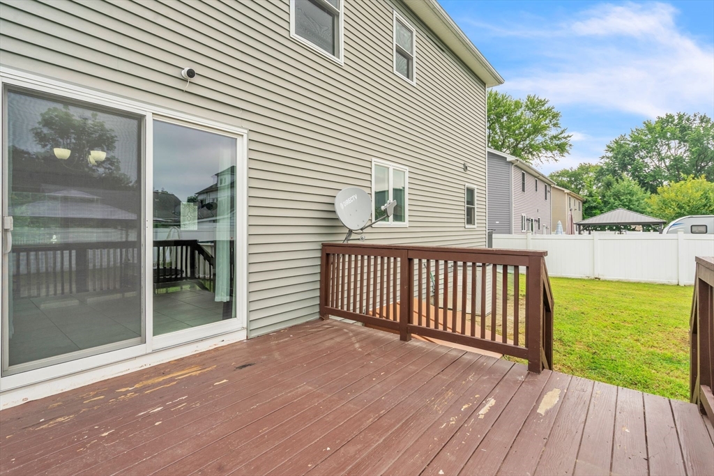 25 Thomas Street Chicopee, MA 01013 - Photo 30 of 36 a view of a house with a deck