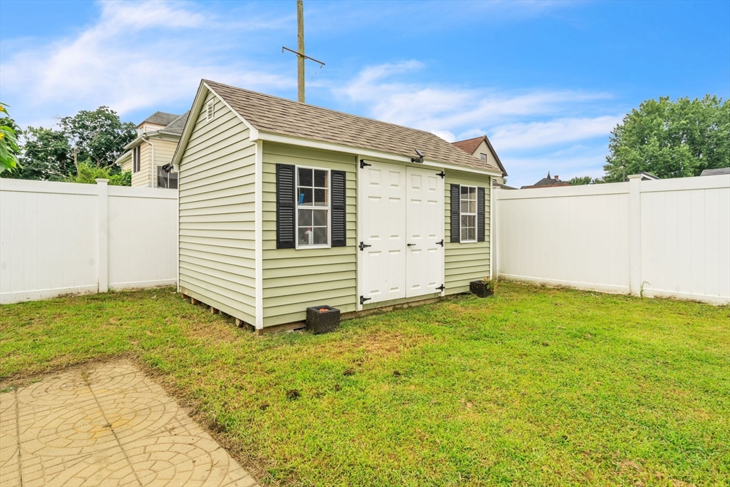 25 Thomas Street Chicopee, MA 01013 - Photo 36 of 36 a view of a house with a yard