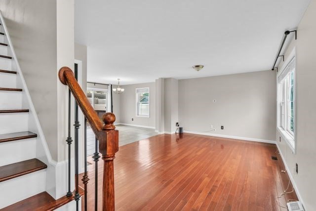 25 Thomas Street Chicopee, MA 01013 - Photo 6 of 36 a view of entryway with wooden floor and stairs