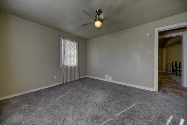 an empty room that has a window