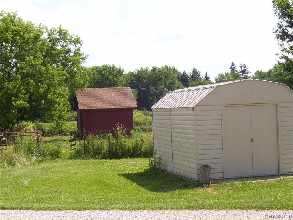 9868 Crane Road Milan, MI 48160 - Photo 33 of 41 SHED AND HORSE