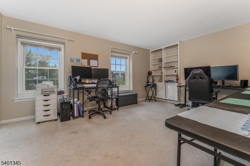 2103 Jamestown Common Hillsborough, NJ 08844 - Photo 12 of 18 a view of a workspace with furniture and a window