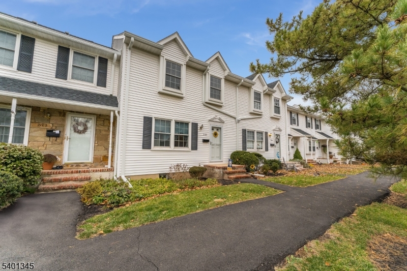 2103 Jamestown Common Hillsborough, NJ 08844 - Photo 2 of 18 a front view of a house with garden