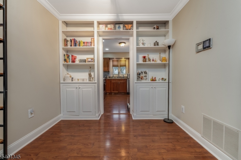 2103 Jamestown Common Hillsborough, NJ 08844 - Photo 6 of 18 a kitchen with stainless steel appliances a refrigerator and wooden floor