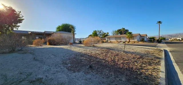 a row of car parked on the side of the road