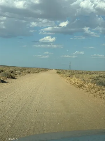 a view of beach and lake