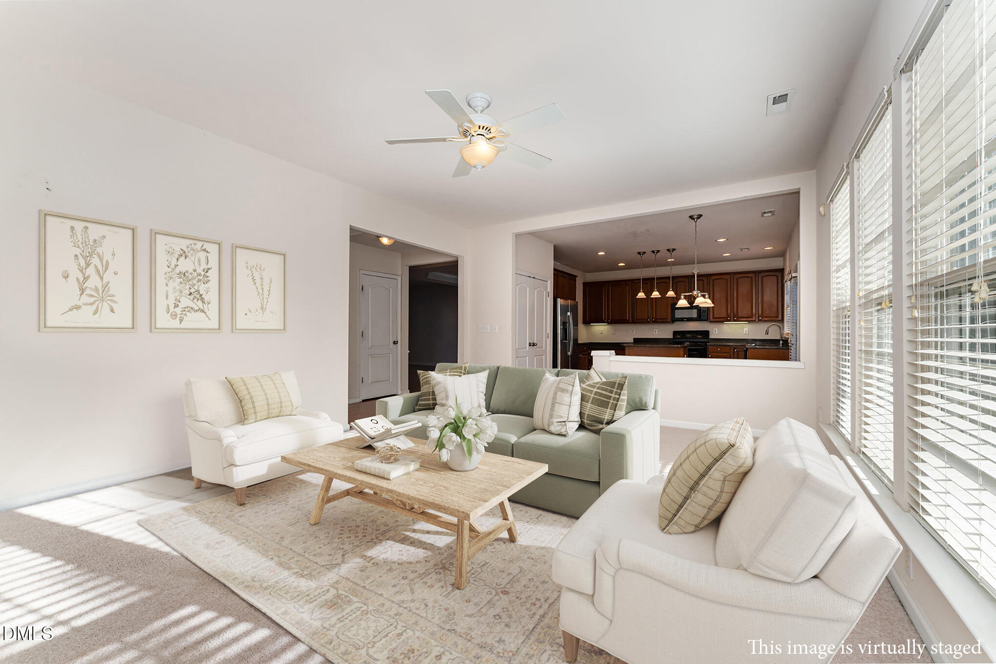 12347 Honeychurch Street Raleigh, NC 27614 - Photo 17 of 62 a living room with furniture and view of kitchen