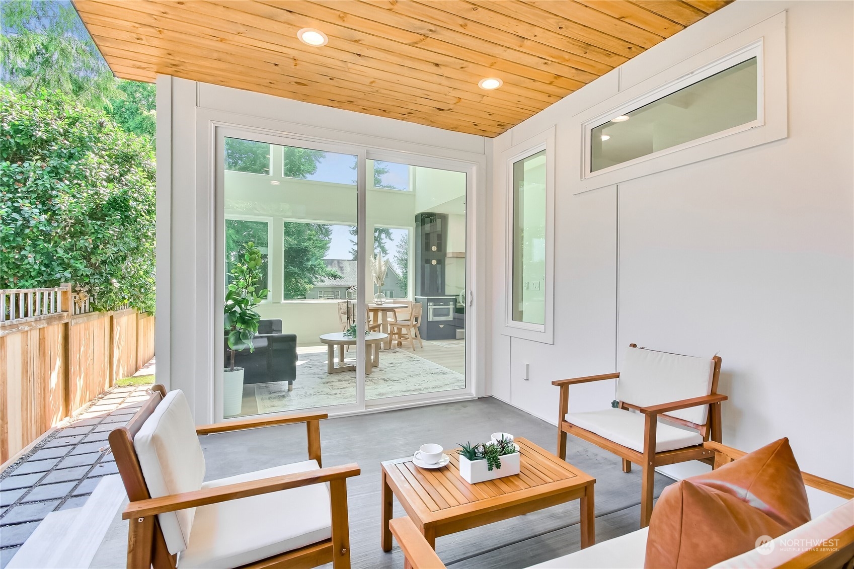 6839 35th Avenue Northeast, Unit A Seattle, WA 98115 - Photo 16 of 39 a dining room with furniture and wooden floor